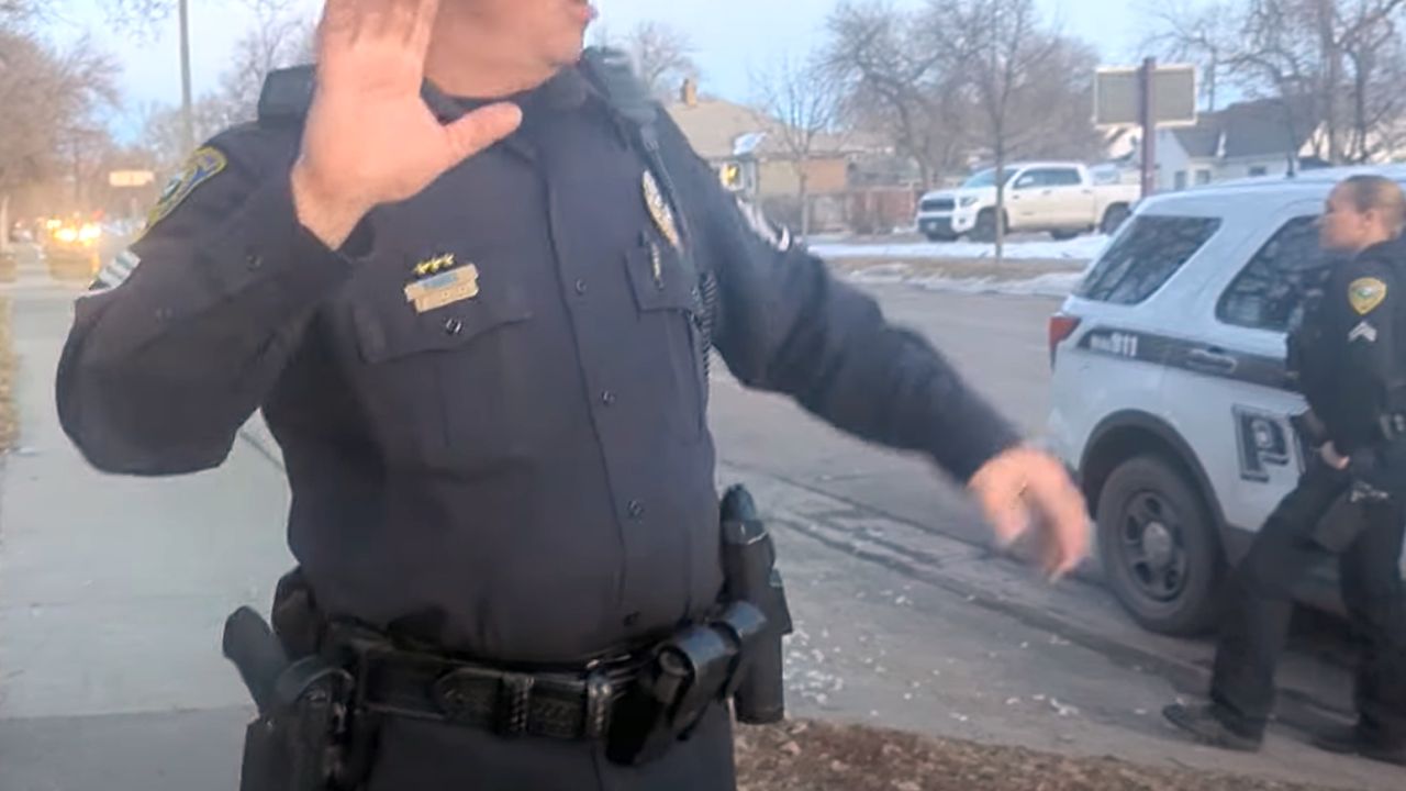 GFPD officer and a man making a video